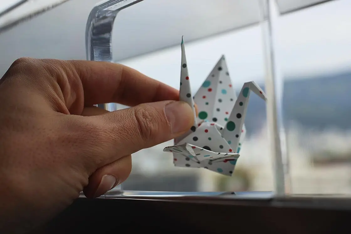 Folded paper cranes have become a powerful symbol of remembrance and the hope for peace